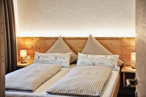 Postel nebo postele na pokoji v ubytování Appartements Rosenhof