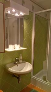 Koupelna v ubytování Apartmány Donovaly + 19 fotografií