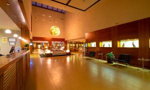 a large lobby with a waiting room with a couch at Hotel Spa Attica21 Vilalba in Villalba +66 photos