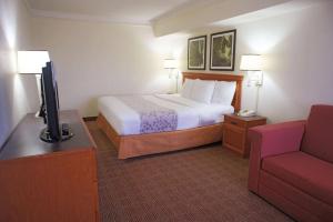 Postelja oz. postelje v sobi nastanitve La Quinta by Wyndham Coral Springs University Dr