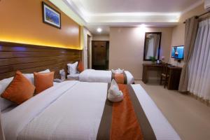 Ένα ή περισσότερα κρεβάτια σε δωμάτιο στο Hotel Lake Star