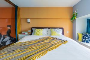 Postel nebo postele na pokoji v ubytování Lavender Apartment Branch