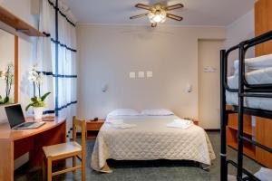 Postel nebo postele na pokoji v ubytování Hotel Pierre + 37 fotografií