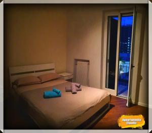 Postel nebo postele na pokoji v ubytování Appartamento Claudia