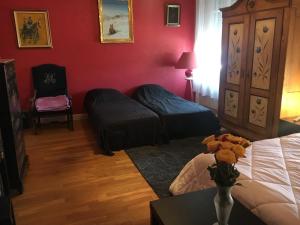 Postel nebo postele na pokoji v ubytování Chambres Privatives Chez l'Habitant