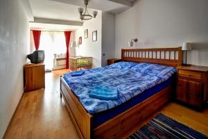 Postel nebo postele na pokoji v ubytování Apartmány Donovaly