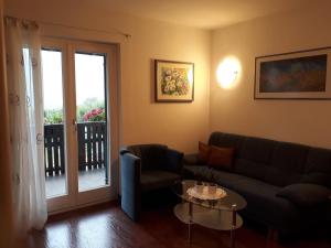 A seating area at GRETL - Residence