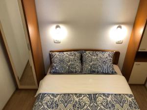 Posteľ alebo postele v izbe v ubytovaní MI-MA Ul. Prilaz 1 51250, Novi Vinodolski, Hrvatska Apartman