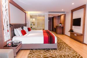 Postel nebo postele na pokoji v ubytování Radisson Udaipur