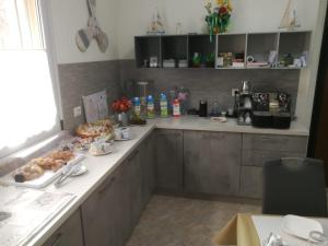 Kuchyň nebo kuchyňský kout v ubytování Scilla Resort
