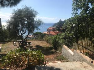 a view of the ocean from a house at Casa del sasso in Bergeggi