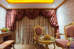 A seating area at Grand Ambiance Hotel