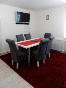 Televízia a/alebo spoločenská miestnosť v ubytovaní Apartment for your Holiday