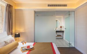 Letto o letti in una camera di YMCA Three Arches Hotel
