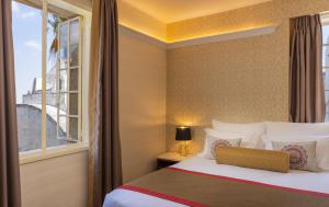Letto o letti in una camera di YMCA Three Arches Hotel