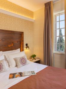 Letto o letti in una camera di YMCA Three Arches Hotel