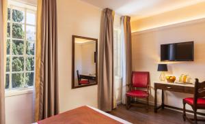 TV o dispositivi per l'intrattenimento presso YMCA Three Arches Hotel
