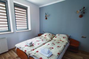 Postel nebo postele na pokoji v ubytování Noclegi Na Granicy