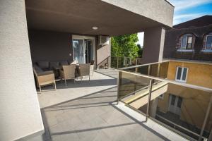 Un balcon sau o terasă la Francesca Apartman