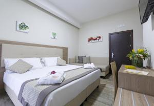 Postel nebo postele na pokoji v ubytování Hotel del Sole