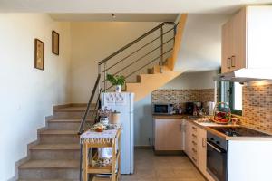 A kitchen or kitchenette at House Myrtos