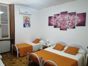 Letto o letti in una camera di Albergo Ollolai