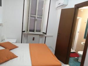 Letto o letti in una camera di Albergo Ollolai