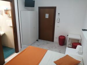 Letto o letti in una camera di Albergo Ollolai