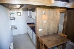 Kuchyň nebo kuchyňský kout v ubytování A casa do viveiro + 11 fotografií
