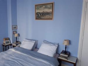 
Cama ou camas em um quarto em Guesthouse De Roos
