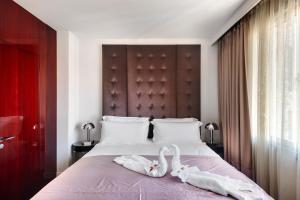 Rúm í herbergi á Lady Stern Jerusalem Hotel