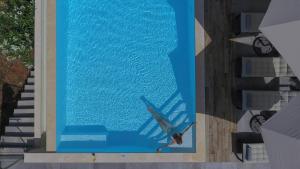 The swimming pool at or close to Drimonari Villas