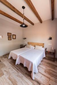 Ένα ή περισσότερα κρεβάτια σε δωμάτιο στο Casa Rural Las Caleras