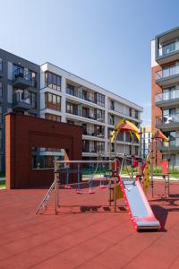 Detský kútik v ubytovaní Orange, modern apartment in the city centre