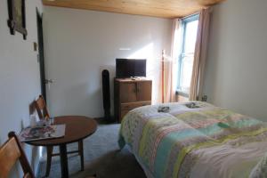 Postel nebo postele na pokoji v ubytování Historic Hotel Bayview