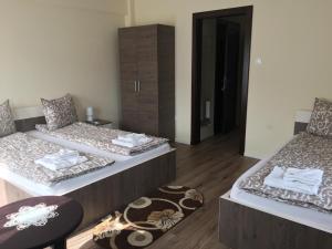 Ein Bett oder Betten in einem Zimmer der Unterkunft Farkas Panzió