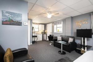 a living room with a couch and a table at Music Valley Studio - No Stairs - Opryland Area in Nashville