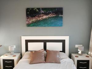 Postel nebo postele na pokoji v ubytování Casa Bella Murcia + 10 fotografií