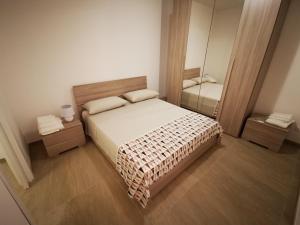 Łóżko lub łóżka w pokoju w obiekcie Case al castello