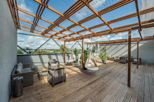 Imagen de la galería de Zaliakalnio terasos apartamentai, en Kaunas