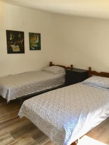 Katil atau katil-katil dalam bilik di Villa Milka
