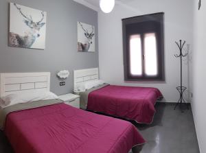 Lova arba lovos apgyvendinimo įstaigoje Villa Rural El Mirador
