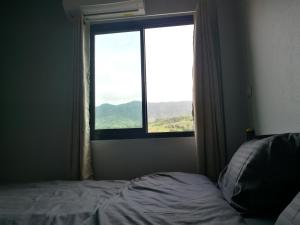 Postel nebo postele na pokoji v ubytování Ingkho Khao Kho อิงค้อ เขาค้อ