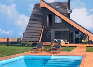 Bazén v ubytovaní Zoe Luxury House alebo v jeho blízkosti