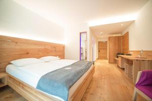 Posteľ alebo postele v izbe v ubytovaní Vegan Hotel La Vimea