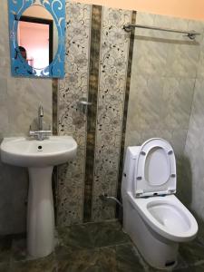 Koupelna v ubytování Hotel Brisha Sarangkot + 37 fotografií