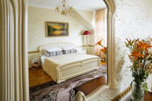 Кровать или кровати в номере Santorini