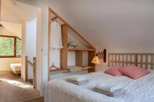 Postel nebo postele na pokoji v ubytování Ecolodge de Parel Schoorl