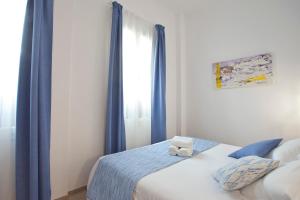 Posteľ alebo postele v izbe v ubytovaní Boutique Hotel Petit Sant Miquel