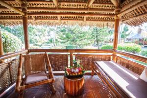 Balkón nebo terasa v ubytování Pura Vida Beach & Dive Resort